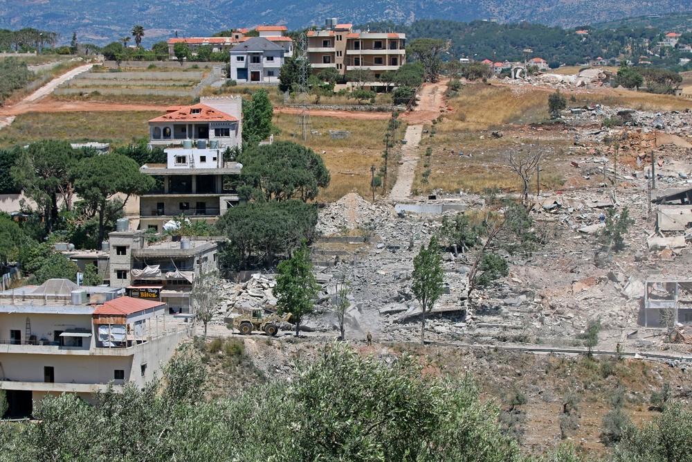 A Lebanese army bulldozer advances along the main road in the southern border village of Debbine on June 4, 2026, as the Israeli military reportedly begins a gradual withdrawal from the village. (AFP/Getty)