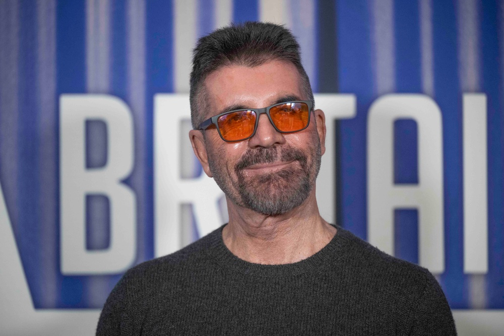 Simon Cowell is recovering from a routine back surgery (Getty)