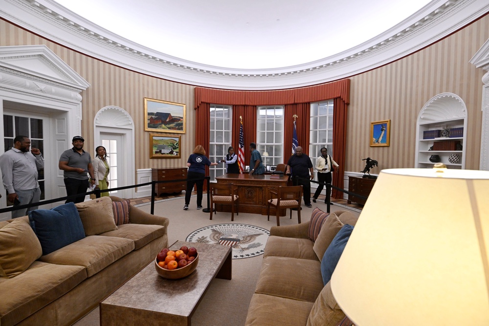 Visitors tour a replica of former President Barack Obama's Oval Office at the Obama Presidential Center (AP Photo/Paul Beaty)