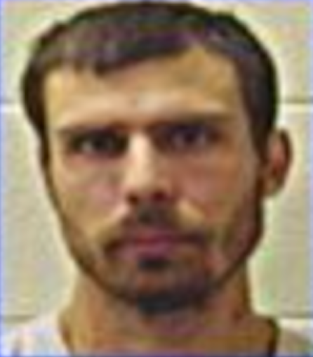 Roy Curtis Zornes II, seen here after his 2010 arrest on first-degree murder charges, is now at the center of a lawsuit by a former coworker at an area McDonald's, alleging constant harassment (McClain County Sheriff)
