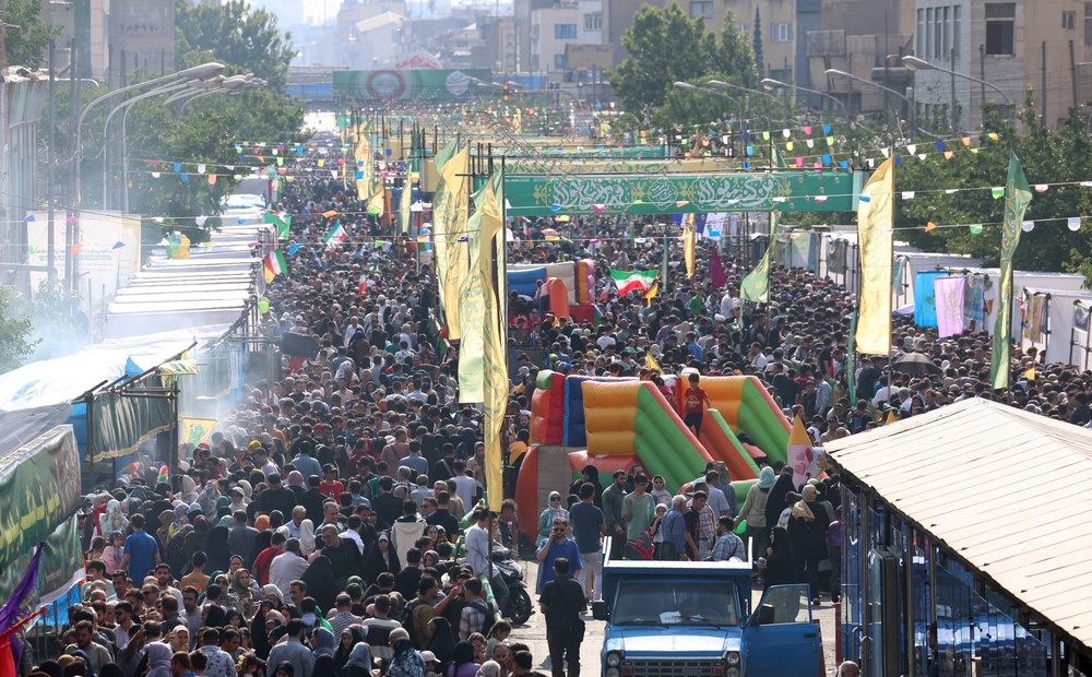 Iranians take part during a rally in support of the country's supreme leader Mojtaba Khamenei and commemorate Eid al-Ghadir in Tehran (AFP/Getty)