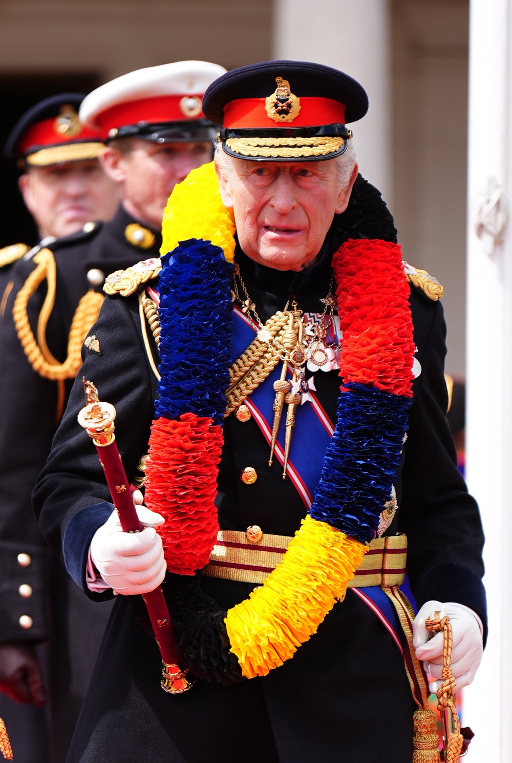 Charles was presented with a mala garland on arrival at the Barracks (Aaron Chown/PA) (PA Wire)