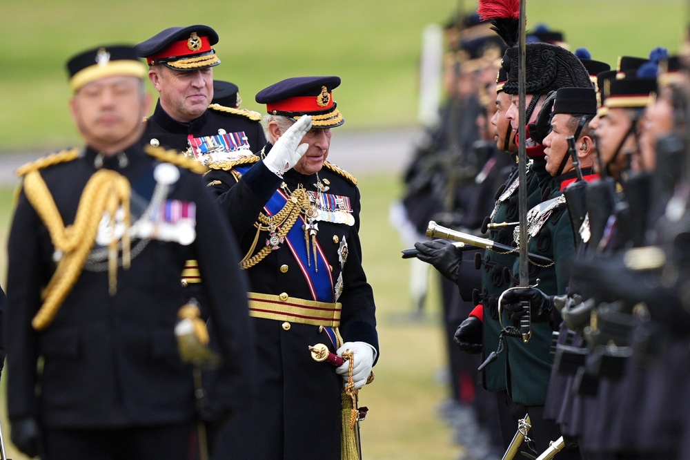 Charles meeting the troops from the King’s Gurkha Artillery (Aaron Chown/PA) (PA Wire)