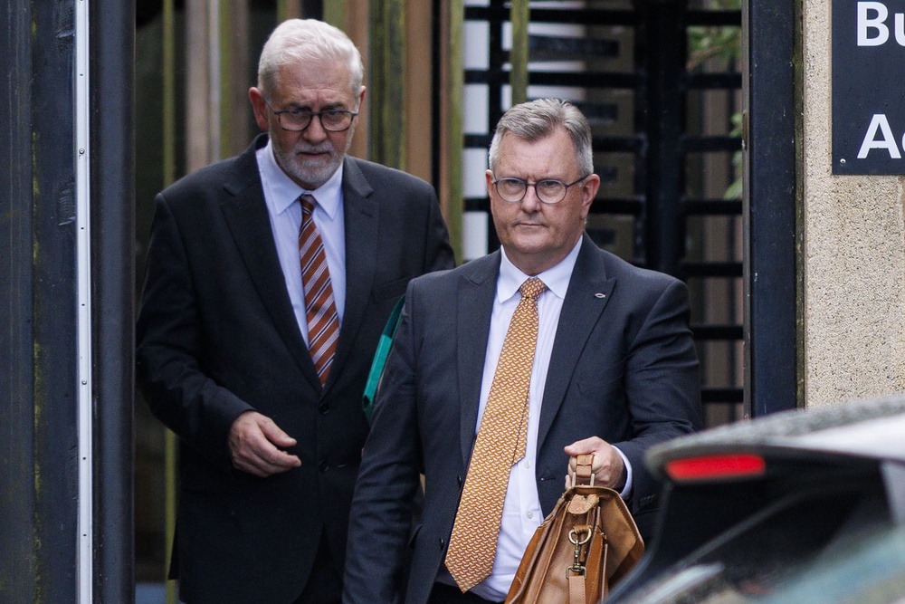 Jeffrey Donaldson leaving Newry Crown Court accompanied by his solicitor John McBurney (Liam McBurney/PA) (PA Wire)