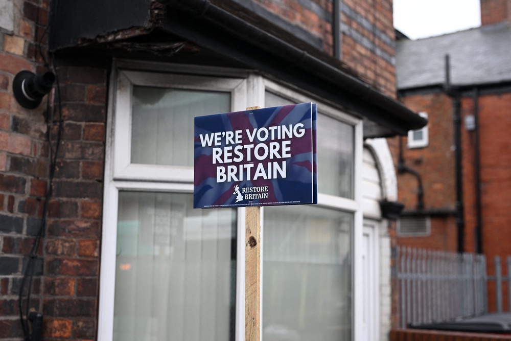 A Restore Britain placard in Ashton-in-Makerfield, one of the main towns in the constituency (AFP/Getty)