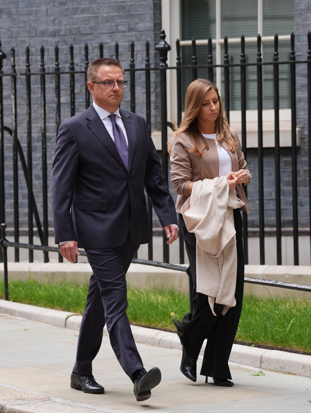 Mark Nowak and Katie Woodcock, the father and stepmother of Henry Nowak, leaving No 10 after a meeting Sir Keir Starmer (Yui Mok/PA) (PA Wire)