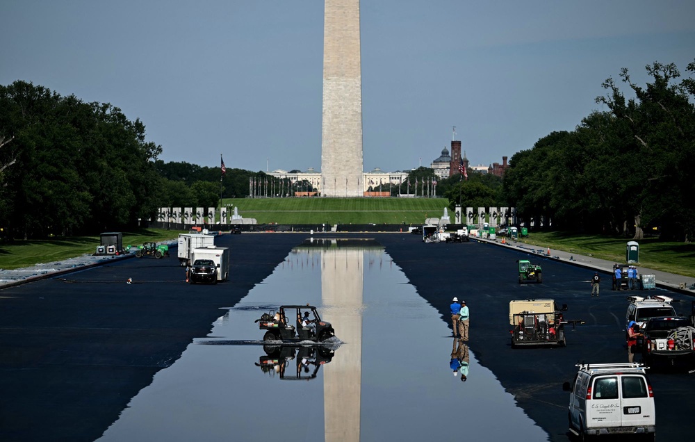 This week, workers began refilling the pool, which dates to the 1920s, after coating the bottom in ‘American flag blue’ (AFP/Getty)