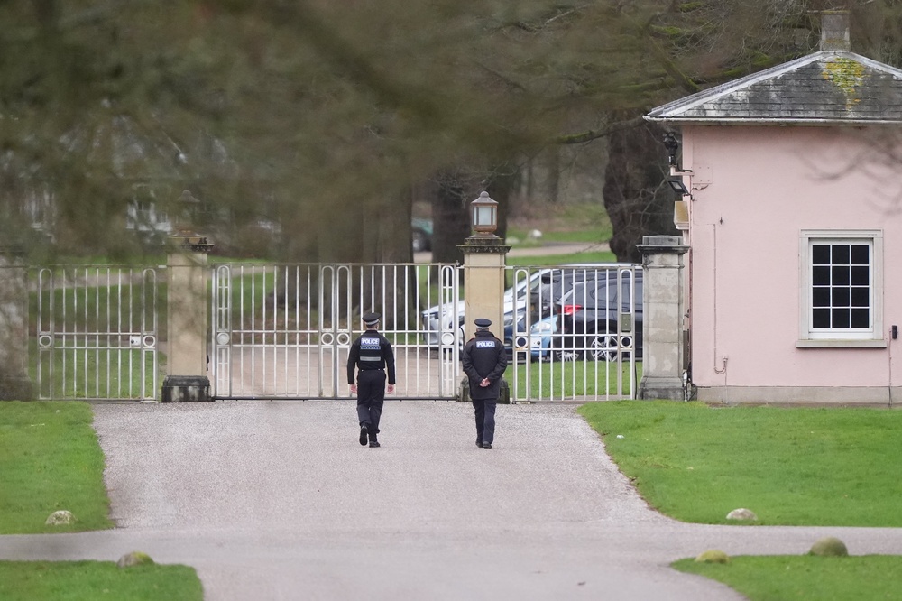 Police officers at Royal Lodge, the former home of Andrew Mountbatten-Windsor in Windsor Great Park, Berkshire (PA)