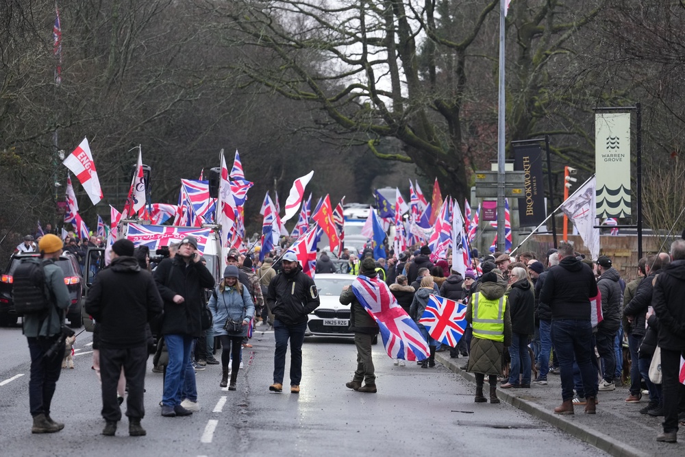 People take part in a protest in Crowborough, East Sussex (PA) (PA Wire)