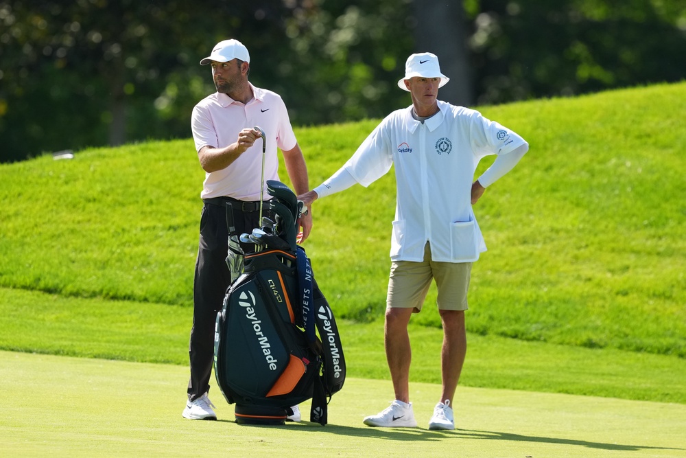 Scottie Scheffler at The Memorial Tournament alongside caddie Ted Scott (Getty)