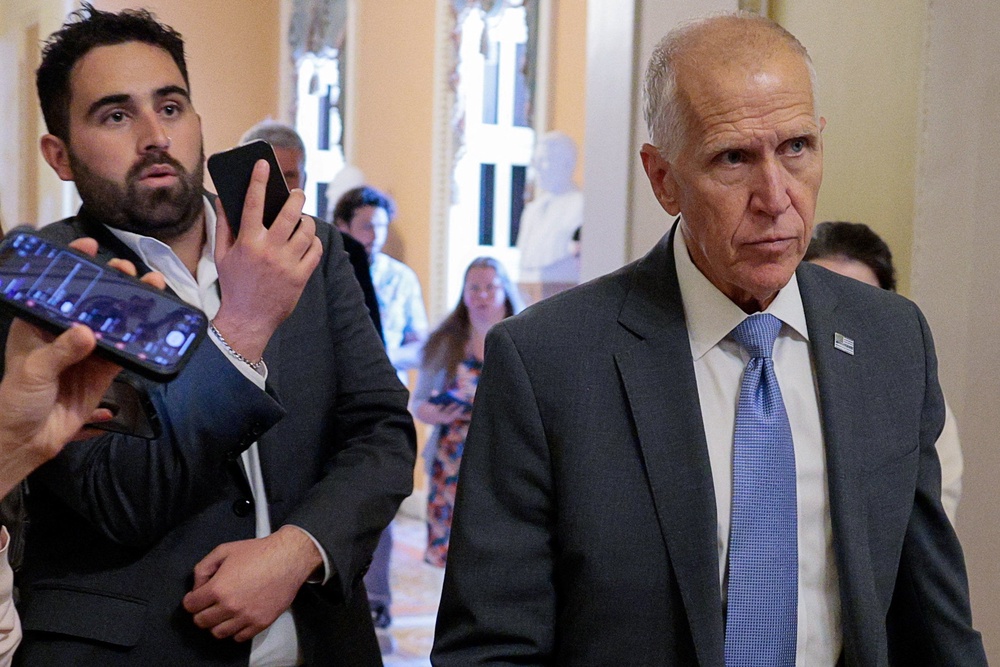 U.S. Senator Thom Tillis (R-NC) walks, on the day of Senate votes, on Capitol Hill (Reuters)