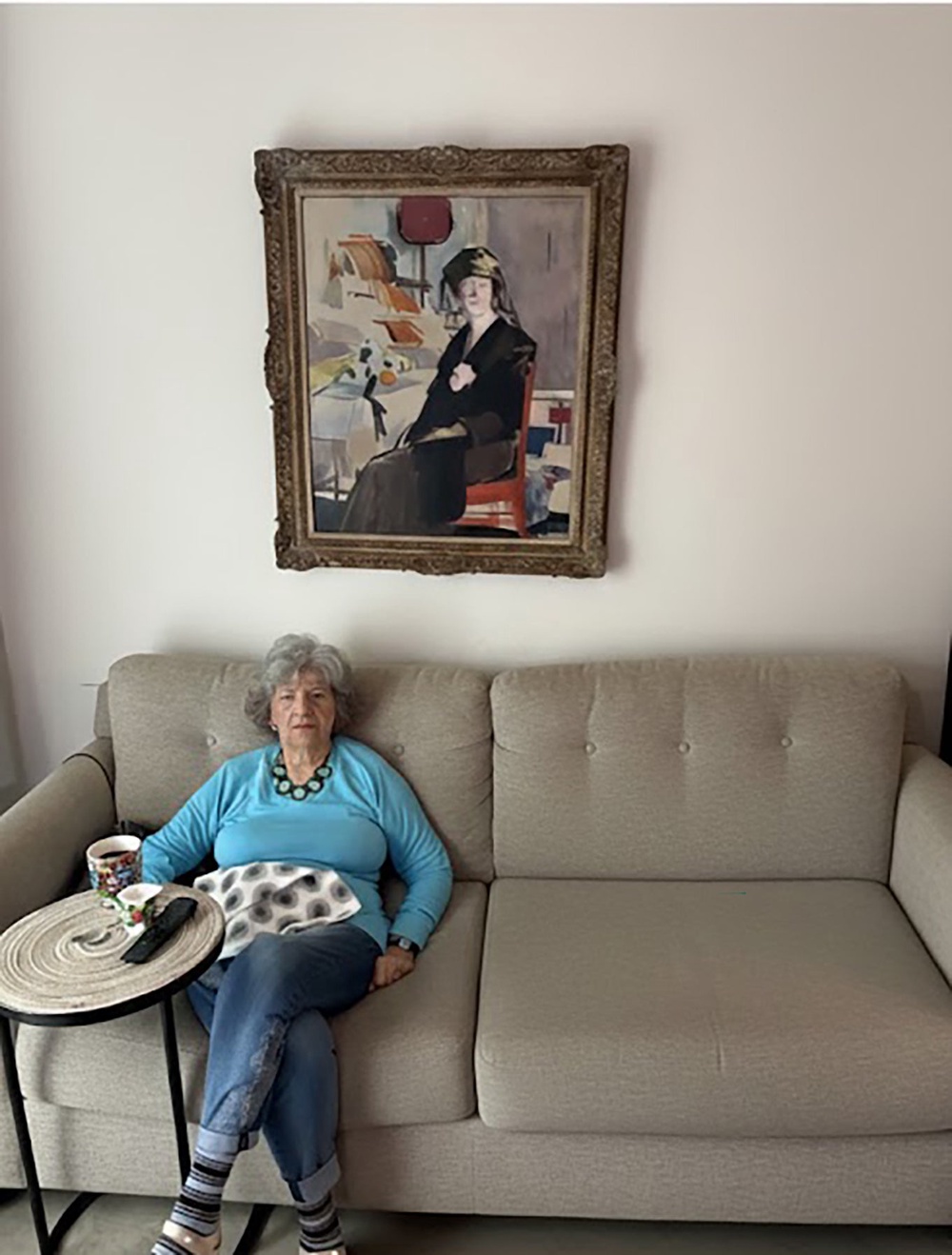 Helene Plotkin with the rediscovered work by FCB Cadell (Plotkin family/PA) (PA Media)