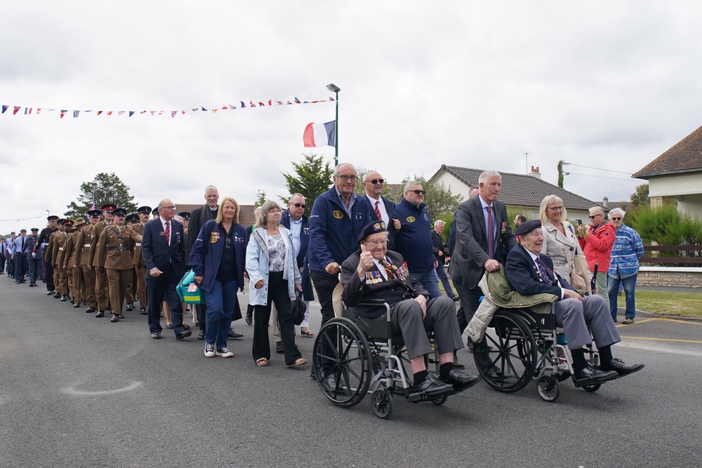 Veterans Ken Hay (front left) and Henry Rice (front right) on a parade to Sword Beach after the Spirit of Normandy Trust service in Coleville-Montgomery (Gareth Fuller/PA) (PA Wire)