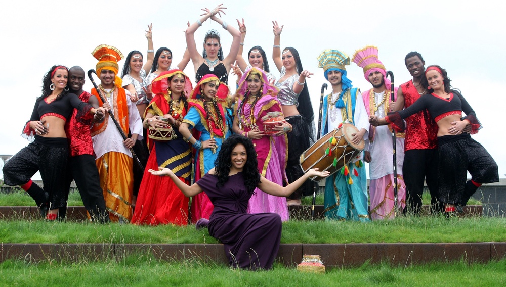 King (centre below) and members of the Punjabi 1 dance group, promoting the awards in 2009 (PA) (PA Archive)