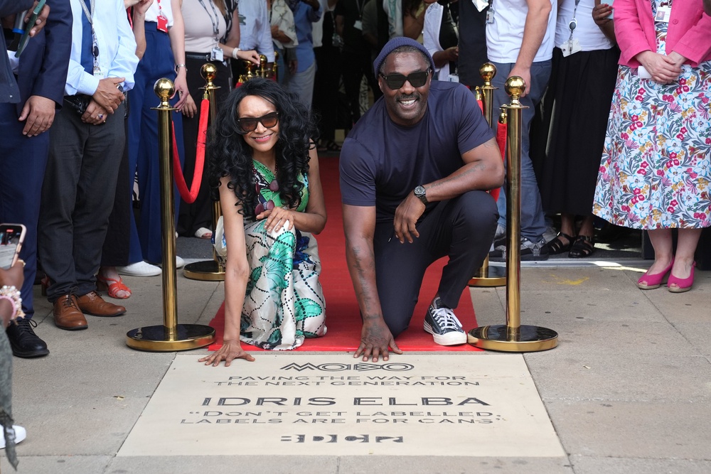 King was joined by Idris Elba during a visit to Barking and Dagenham College to lay a commemorative Mobo ‘Paving the Way’ stone in 2025 (PA) (PA Archive)