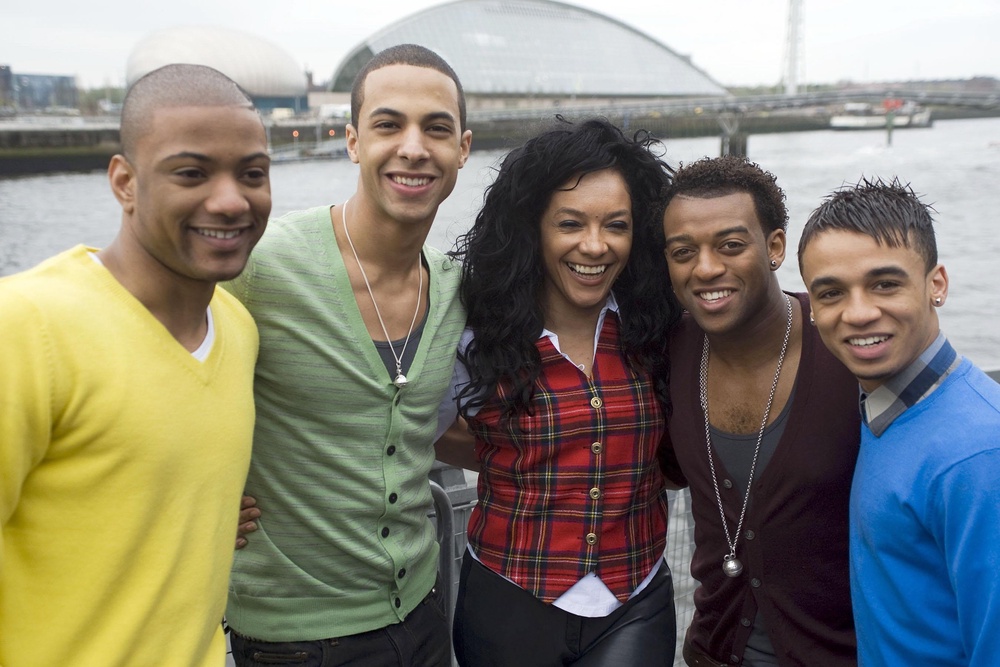 Boyband JLS alongside King in 2009 (PA) (PA Archive)