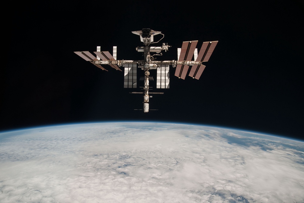 The International Space Station and the docked space shuttle Endeavour orbit Earth in 2011 (Getty Images)