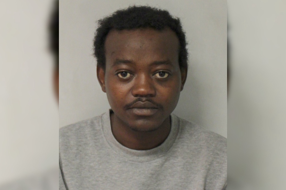 Rasheed Rahman after his arrest for murder (Metropolitan Police)