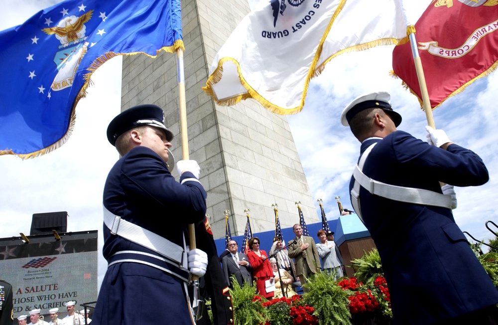 The three quotes slated for removal pertain to slavery, immigrants and commemorating death. Pictured here, an honor guard marches during the opening moments of a 'Salute to Those Who Have Served & Sacrificed' event at the monument in 2004 (Getty Images)