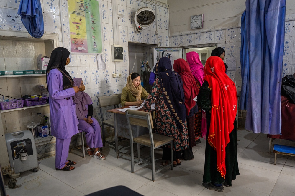 Surgeon Bibi Khadija Sadat, 35, registers patients at the provincial hospital’s maternity unit in Ghazni, Afghanistan (Getty)