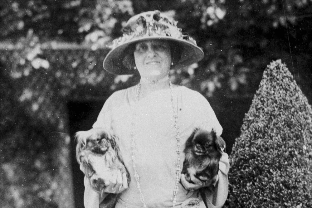 American author Edith Wharton poses with her dogs in France, 1923 (AP)