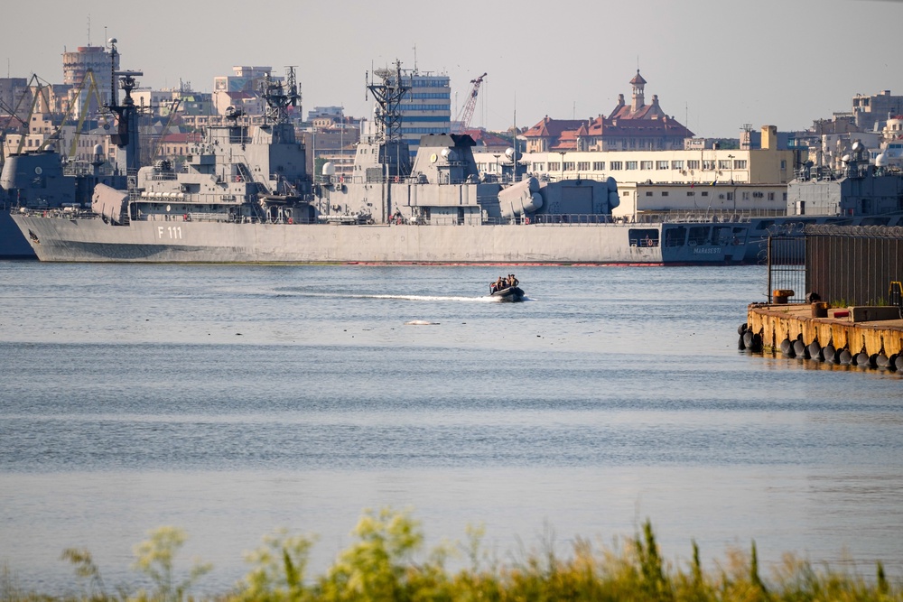 A small military patrol boat sails past the Romanian frigate Marasesti docked in the military port of Constanta following the explosion of a maritime drone in the Black Sea port of Constanta, Romania, Friday, 5 June 2026 (AP)