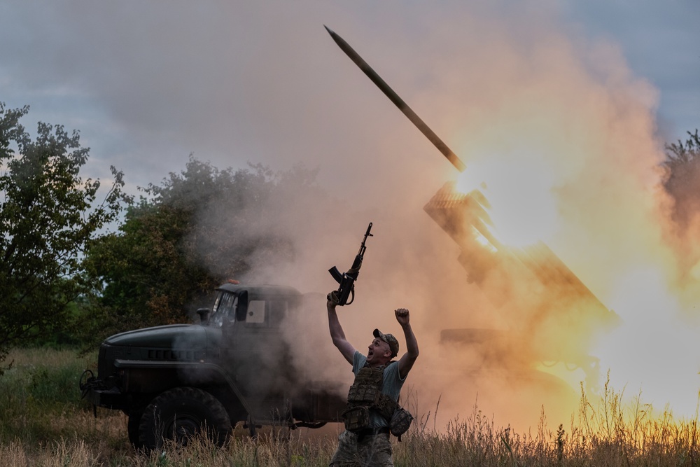 In this photo provided by Ukraine's 93rd Kholodnyi Yar Separate Mechanised Brigade press service, a soldier reacts as an MRLS BM-21 Grad fires at the Russian positions near Kostiantynivka, Donetsk region, Ukraine, Thursday, 4 June 2026 (AP)