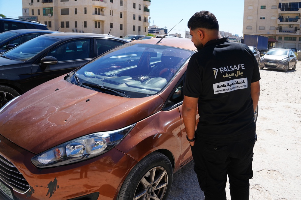 A man inspects the shattered family vehicle of seven month old Palestinian baby boy Sam Fahd Abu Heikal, who was killed on Friday when Israeli soldiers fired at the vehicle carrying him and his parents, in Tel Rumeida, in the West Bank city of Hebron Saturday, June 6, 2026. (AP Photo/Mahmoud Illean) (Copyright 2026 The Associated Press. All rights reserved)