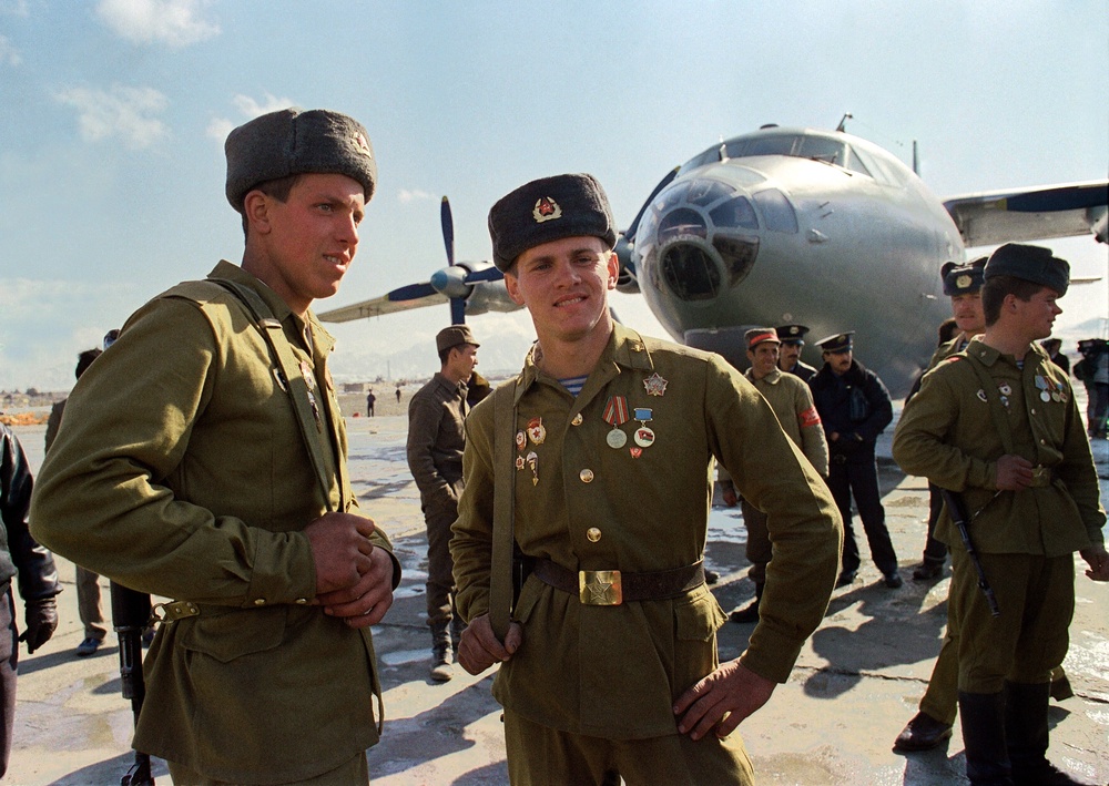 Red Army soldiers wait in front of their plane to leave for the Soviet Union at the Kabul airport in 1989 during Soviet Army withdrawal from Afghanistan (AFP/Getty)