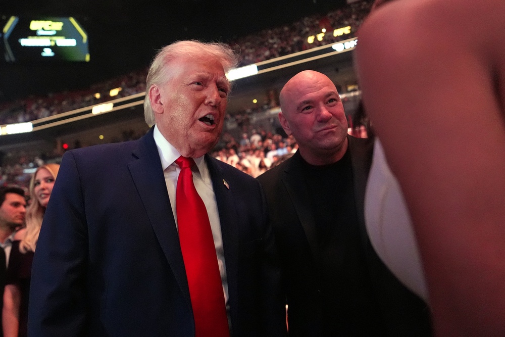 Trump is a longtime fan of the Ultimate Fighting Championship and has become close friends with its CEO and president, Dana White. The president often sits with White ringside (AFP/Getty)