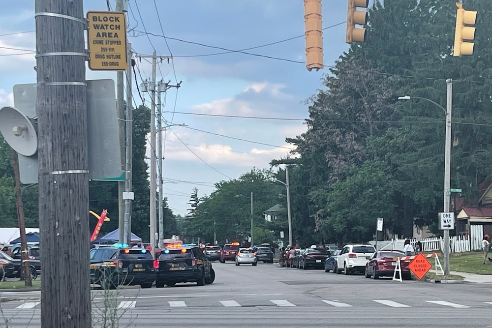 Police in Toledo are hunting for a suspect after a shooting near a local festival sent multiple people to the hospital