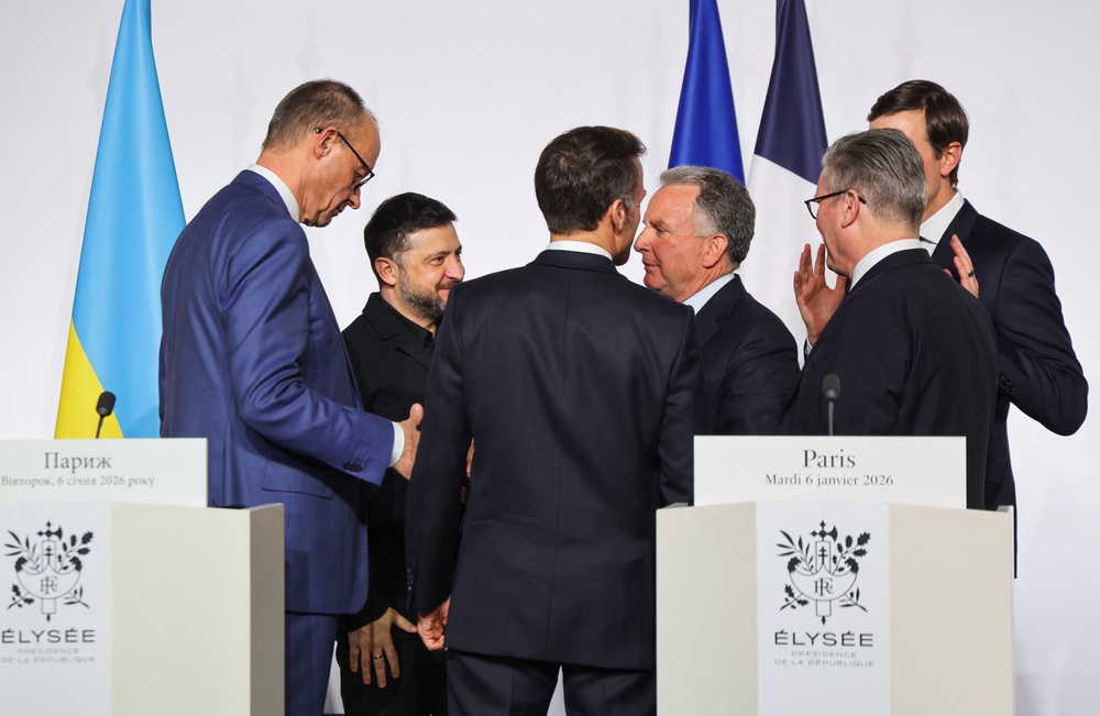 Germany's chancellor Friedrich Merz, Ukraine's president Volodymyr Zelensky, France's president Emmanuel Macron, US Special Envoy Steve Witkoff, Britain's prime minister Keir Starmer and US businessman Jared Kushner speak after a press conference upon the signing of the declaration on deploying post-ceasefire force in Ukraine (AFP/Getty)