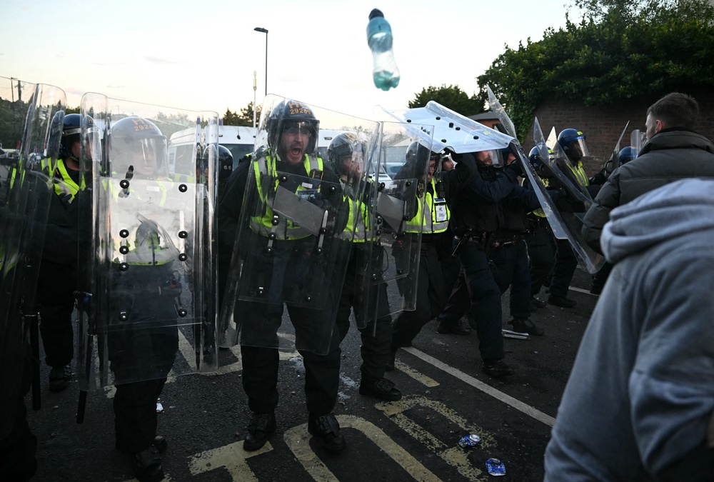 Edward Culver, prosecuting, told the court that a police officer involved in the operation described the protesters as treating the disorder as a 'party or blood-sport' and they feared 'someone could be killed' (AFP/Getty)