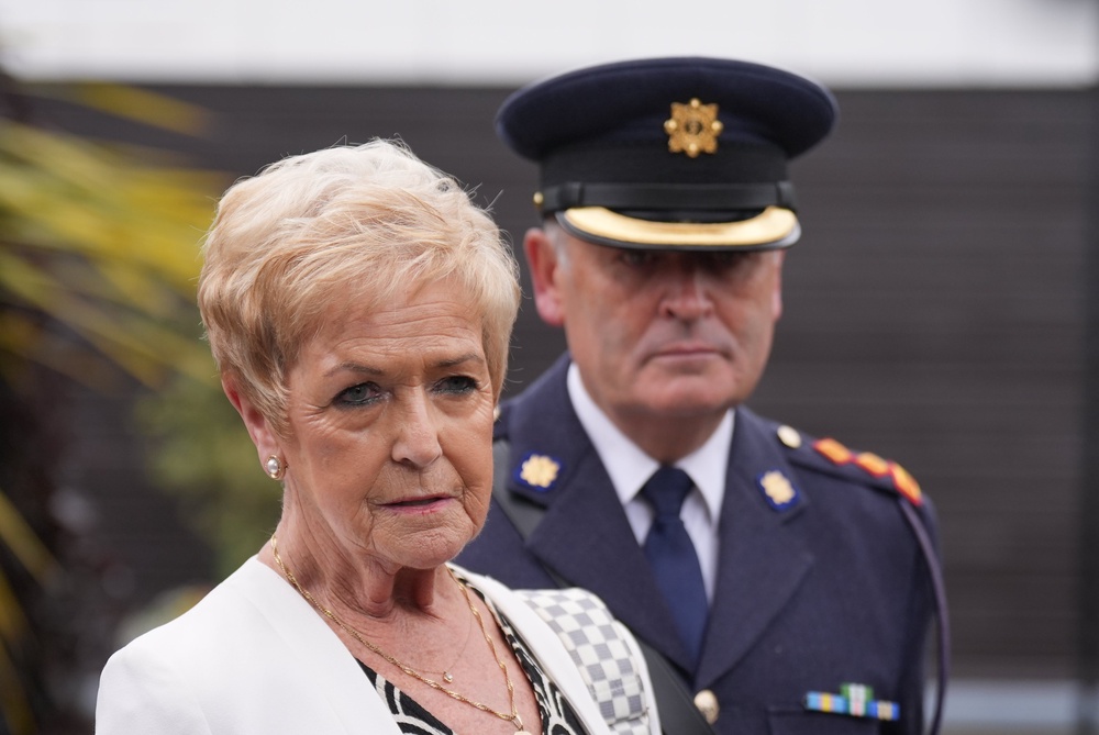 Chief Superintendent of Limerick Garda Division Derek Smart with Ann McCabe, widow of Jerry McCabe, speaking to the media (Niall Carson/PA) (PA Wire)