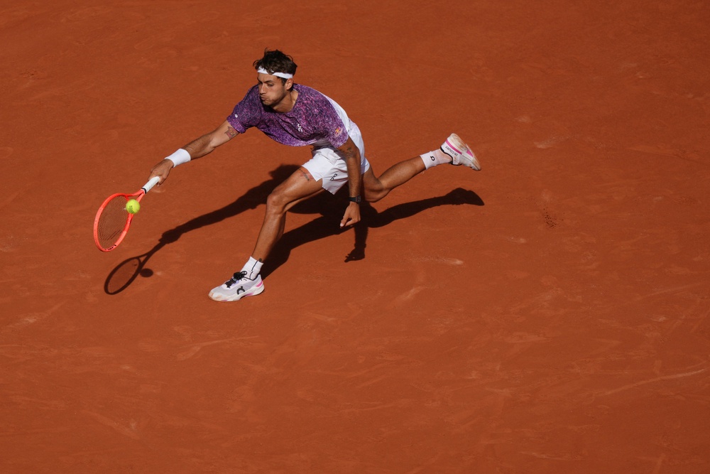 Flavio Cobolli hits a forehand on the run (Aurelien Morissard/AP) (AP)