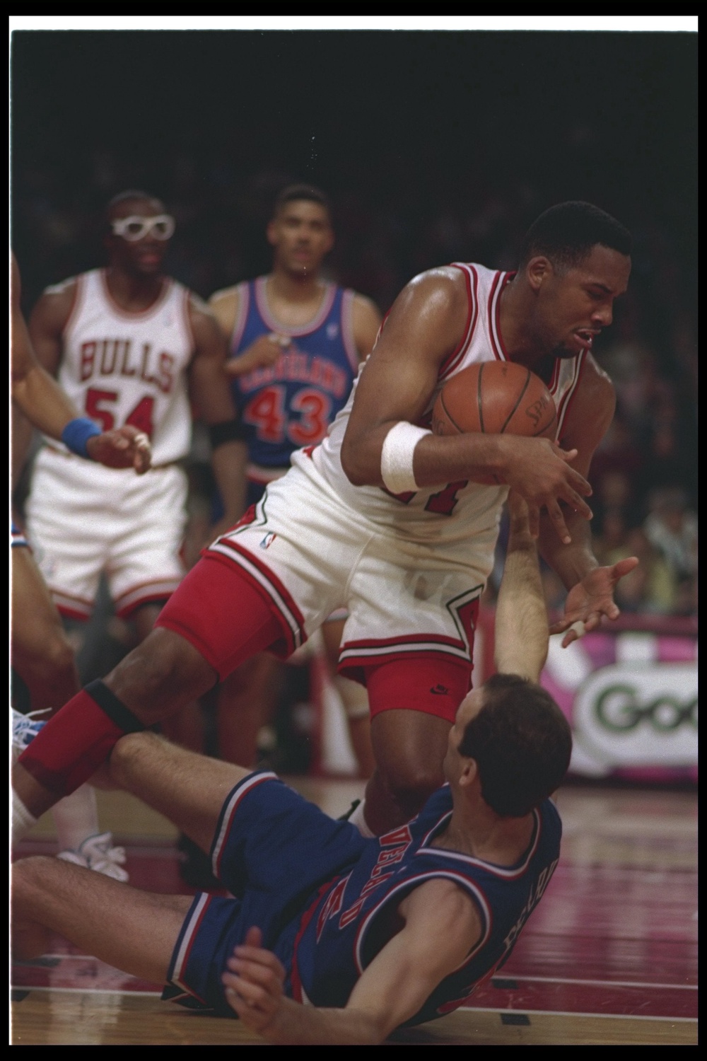 Center Stacey King of the Chicago Bulls looks on after knocking a Cleveland Cavaliers player (Getty Images)