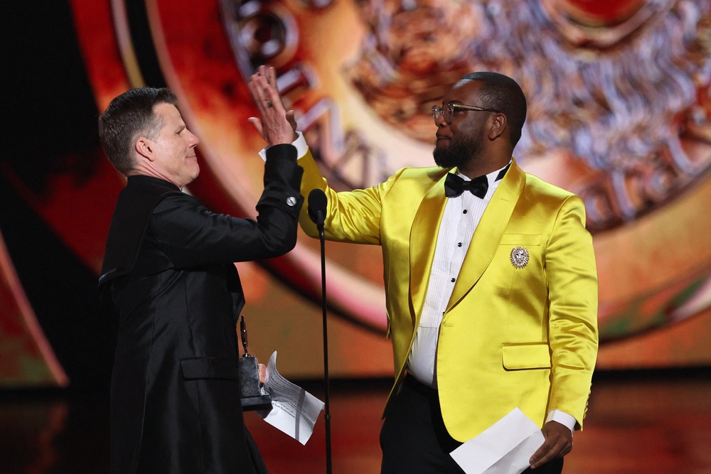 Bill Rauch and Zhailon Levingston accepted the award for Best Direction of a Musical award for ‘Cats: The Jellicle Ball’ (Reuters)
