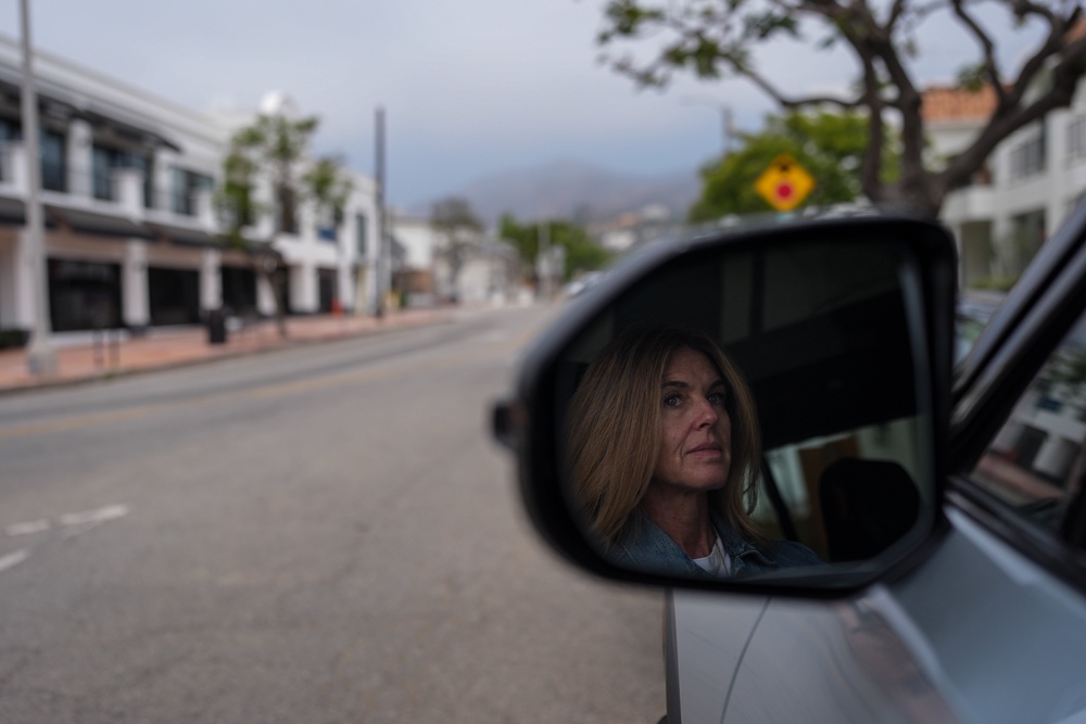 Meghan Wald poses for a photo in her car in the Pacific Palisades neighborhood of Los Angeles (Copyright 2026 The Associated Press. All rights reserved)