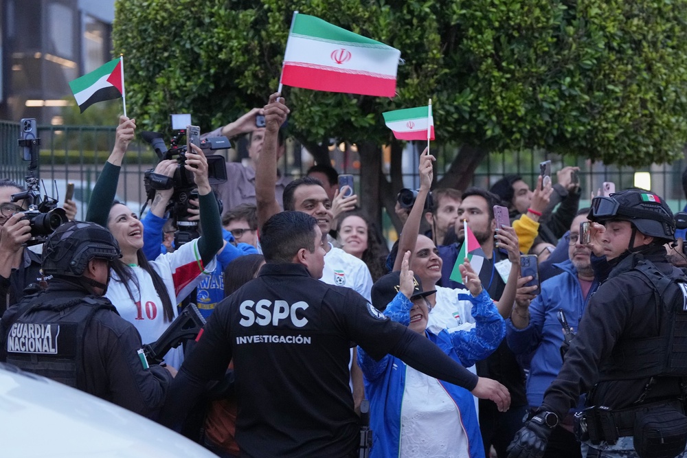Iran fans wave as players arrive in Tijuana, Mexico, on Sunday, June 7, 2026 (AP Photo/Gregory Bull)