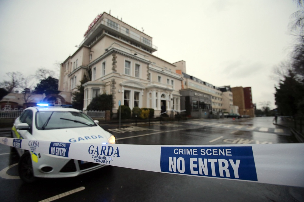 A garda cordon outside the Regency Hotel in Dublin (Niall Carson/PA) (PA Archive)