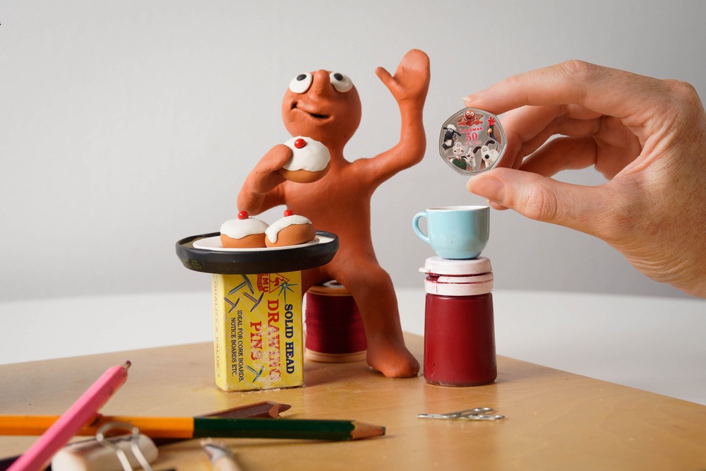 Morph with the new Royal Mint 50 Years of Aardman 50p. (PA)