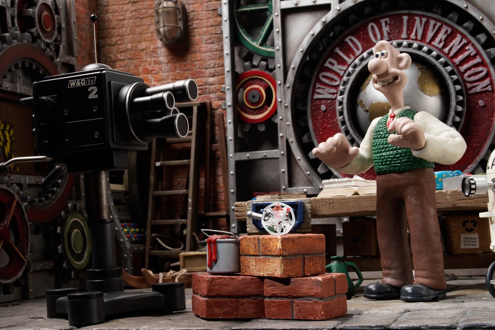 Wallace with the new Royal Mint 50 Years of Aardman 50p (PA)