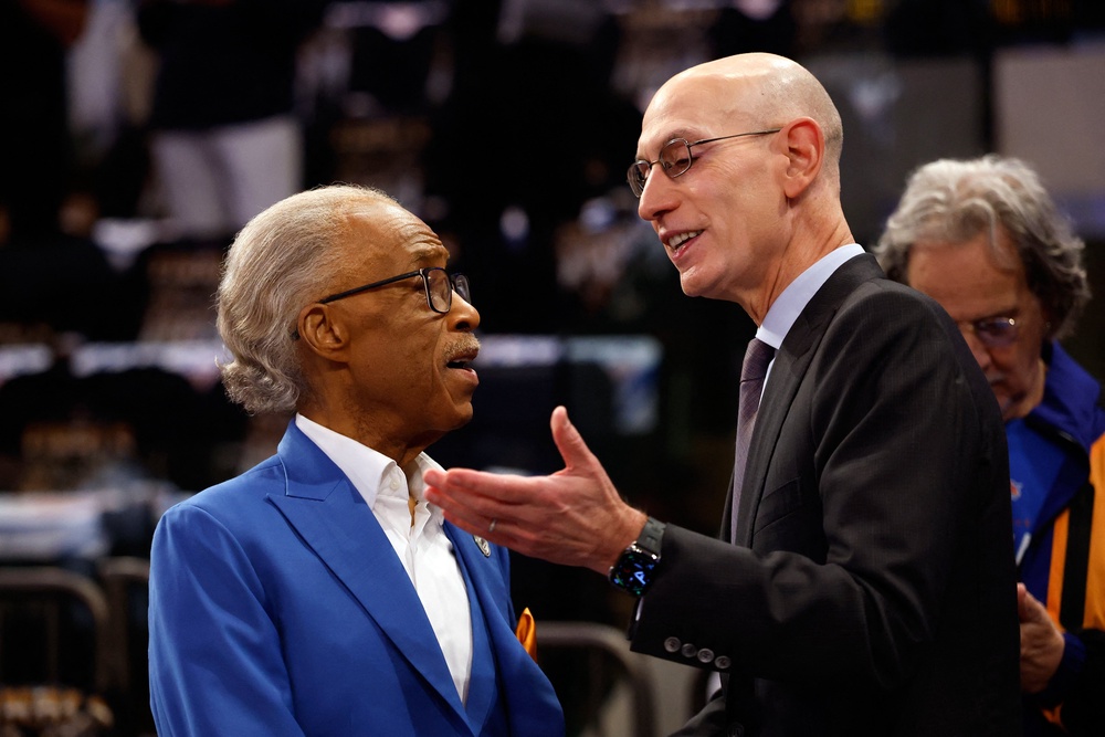 Reverend Al Sharpton (left) talks with NBA commissioner Adam Silver before game 3 of the NBA finals (Geoff Burke-Imagn Images via Reuters)
