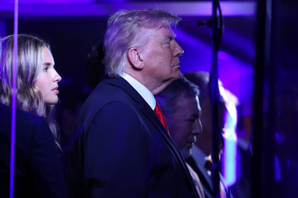 President Donald Trump  stands for the national anthem (Getty)