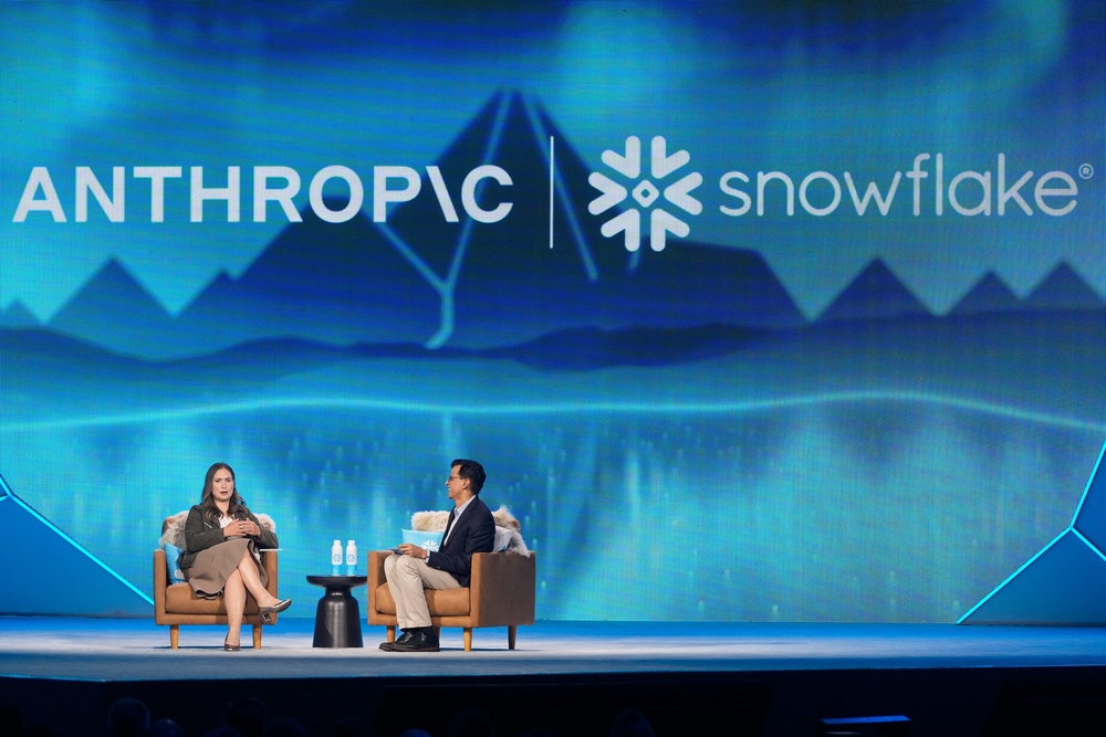 Anthropic co-founder and president Daniela Amodei speaks to Snowflake chief executive Sridhar Ramaswamy during the keynote presentation at Snowflake Summit 26 in San Francisco (Jeff Chiu/AP) (AP)