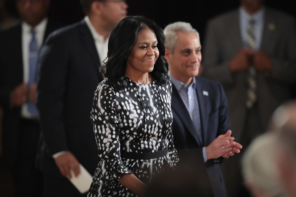 Former first lady Michelle Obama and Chicago Mayor Rahm Emanuel arrive for a roundtable discussion at the South Shore Cultural Center about the Obama Presidential Center (Getty)