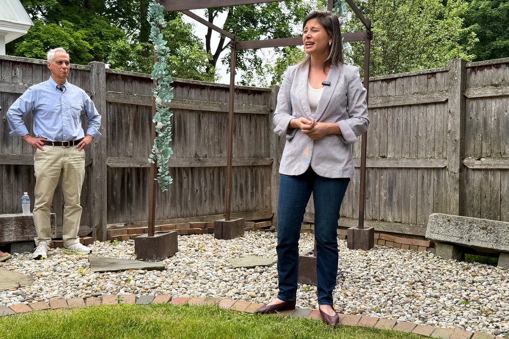 Rep. Maggie Goodlander speaks alongside Rahm Emanuel at a house party in Concord this past Saturday (AP)
