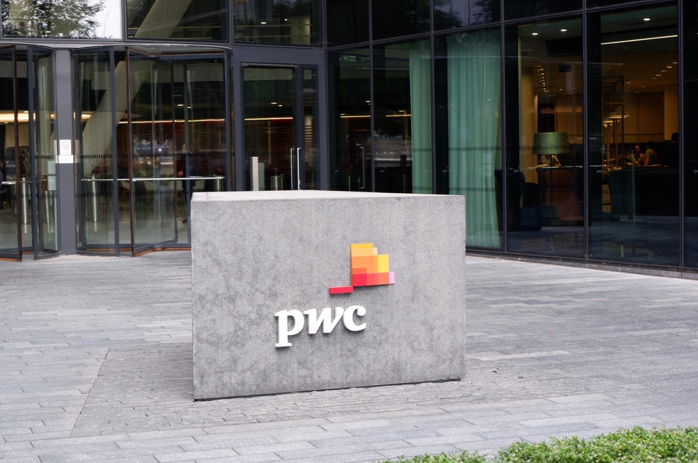 PwC’s cost-cutting measures are part of a bigger trend in which more than half of companies will have cut compensation or benefits by the end of the year (Alamy/PA)