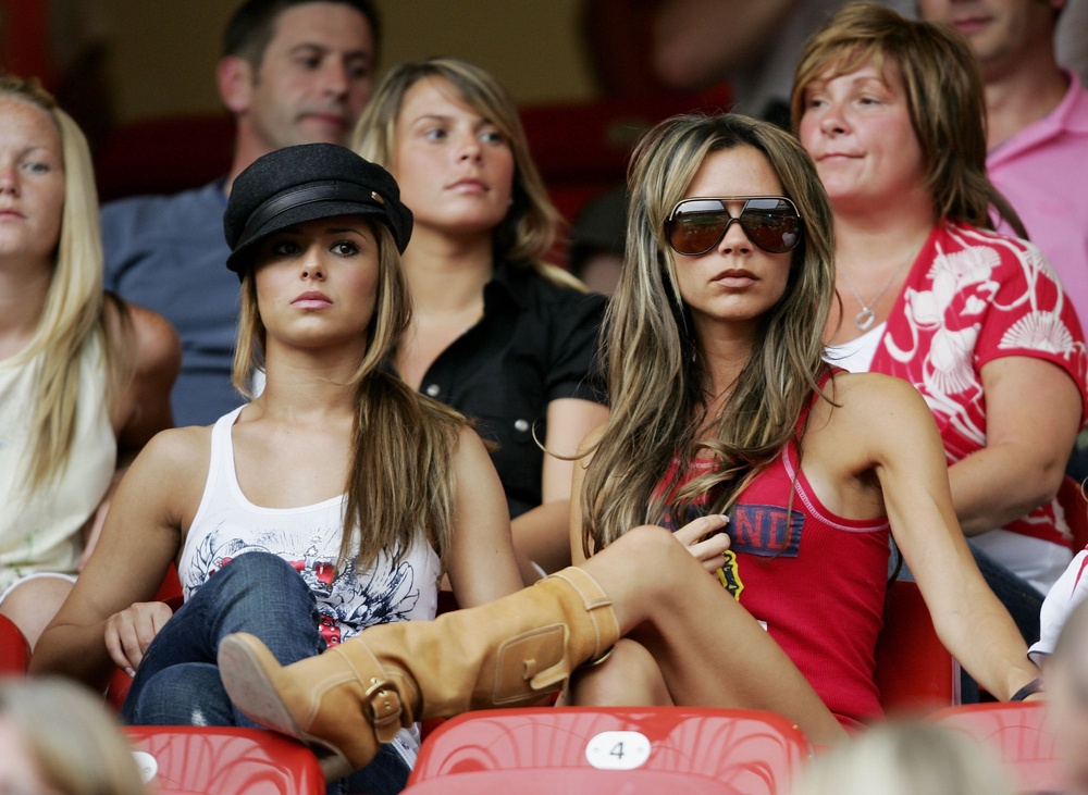 Coleen Rooney and Victoria Beckham ‘cheering’ on Englandi in 2006 (Getty)