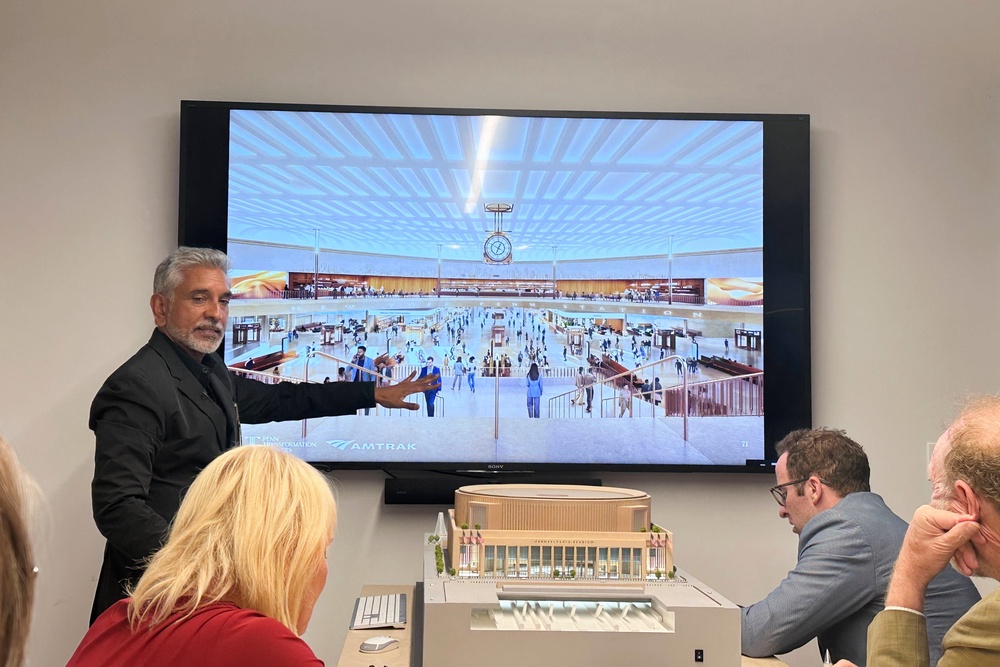 Vishaan Chakrabarti, one of the leaders of the team awarded the project to dramatically redesign New York City's Penn Station, presents architectural designs during a presentation Monday, June 8 (AP)